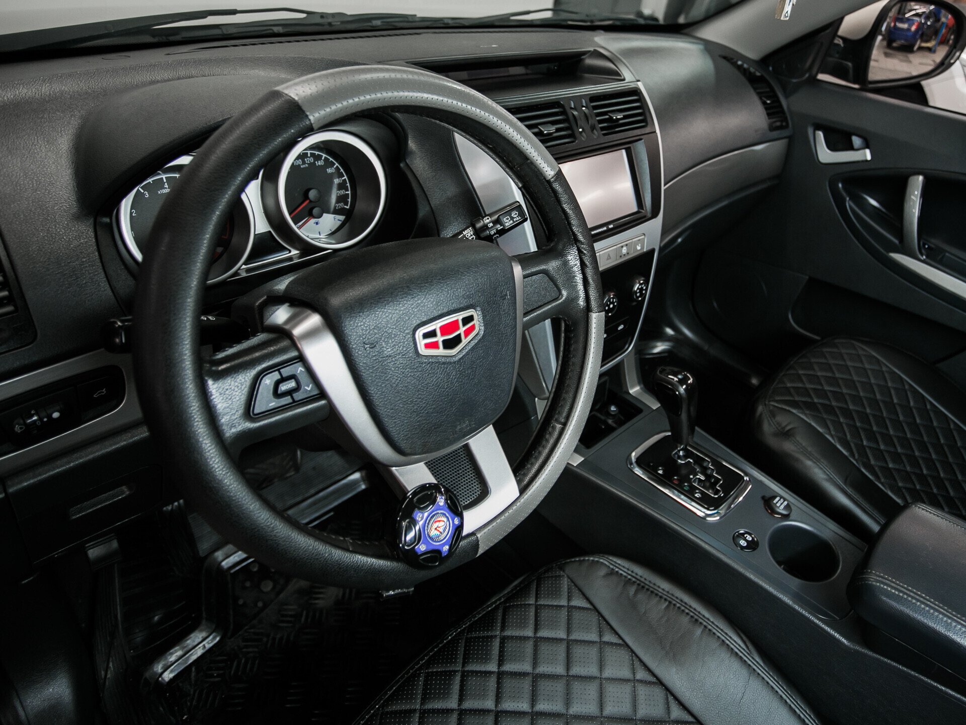 Geely Emgrand X7, I 2.4 AT (148 л.с.)